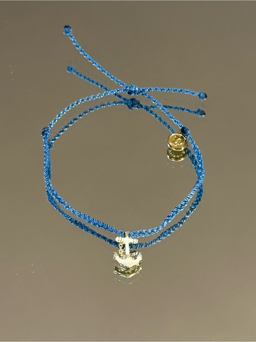 Pura Vida. Blue Cord Bracelet with Gold Anchor Charm